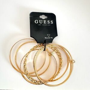 Guess Gold Bangle Bracelet Set with charms.New